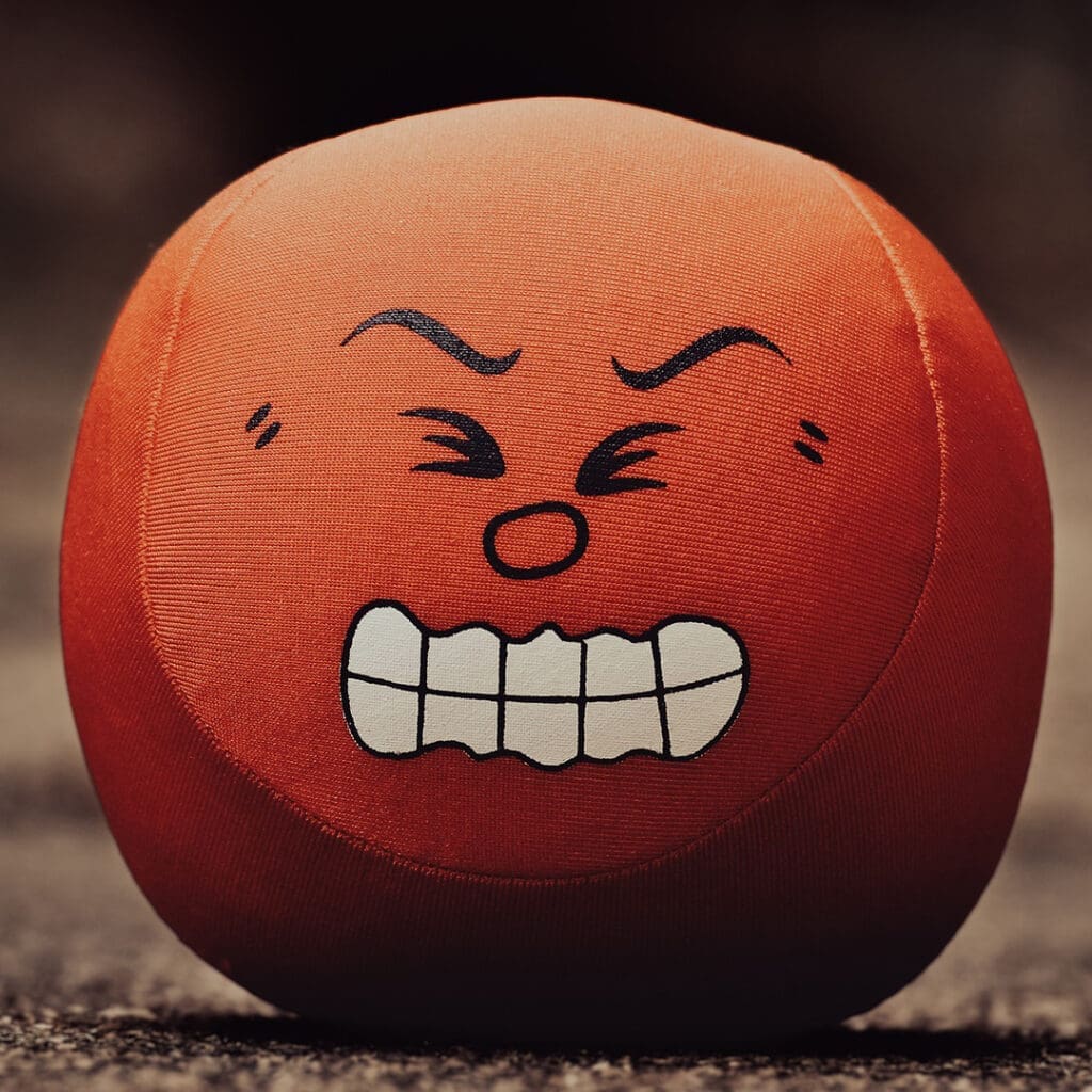 angry looking emoji ball