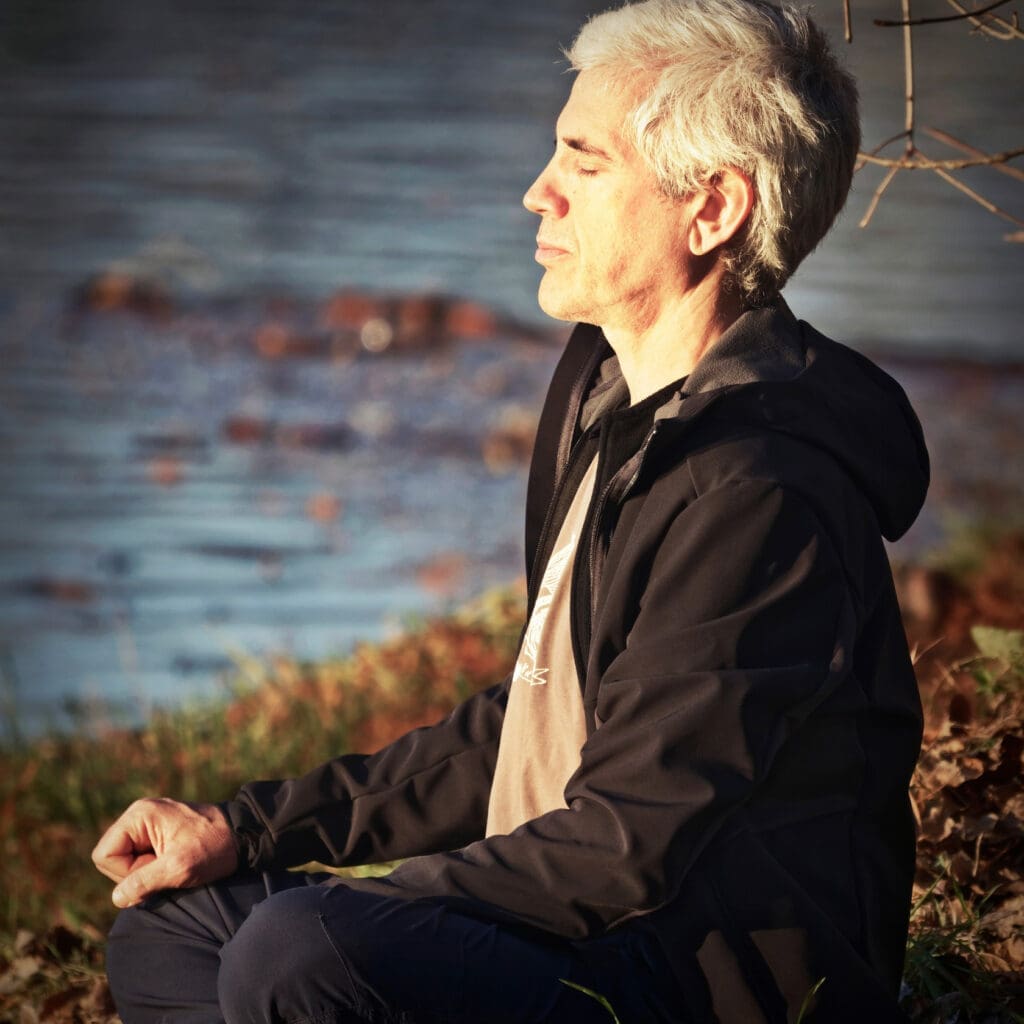 Man sitting in meditation.