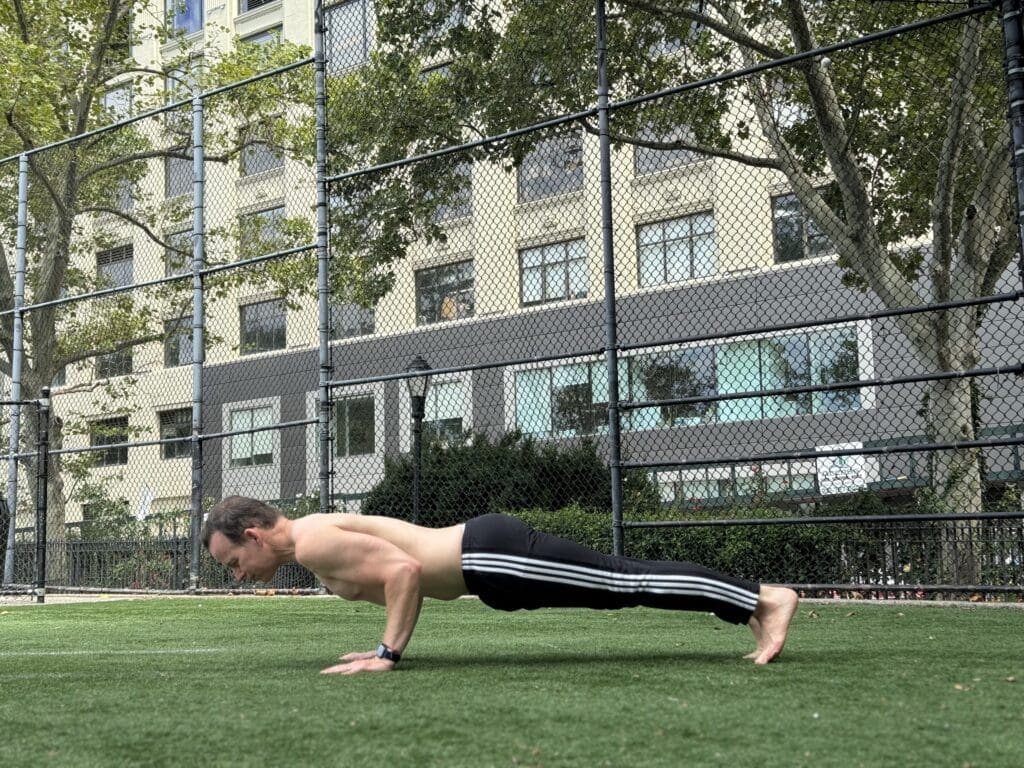 James Donegan performs Chaturanga